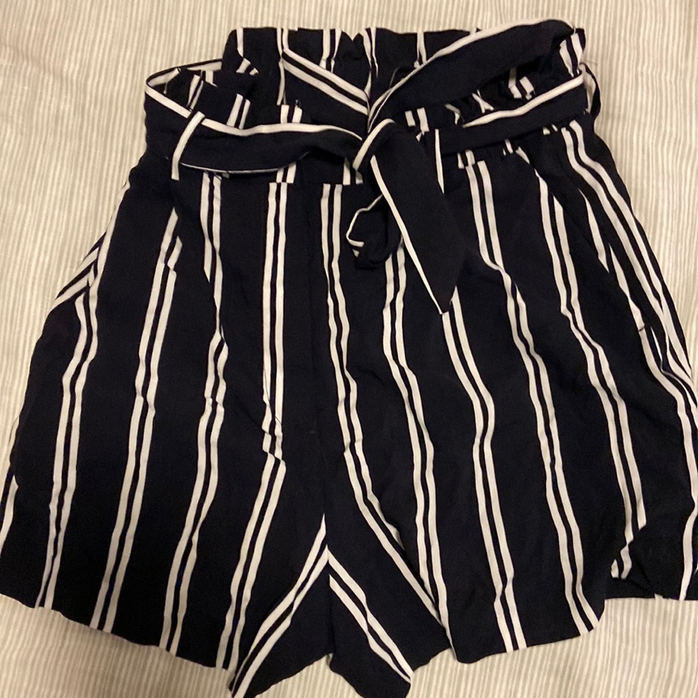 Paper bag style striped shorts.